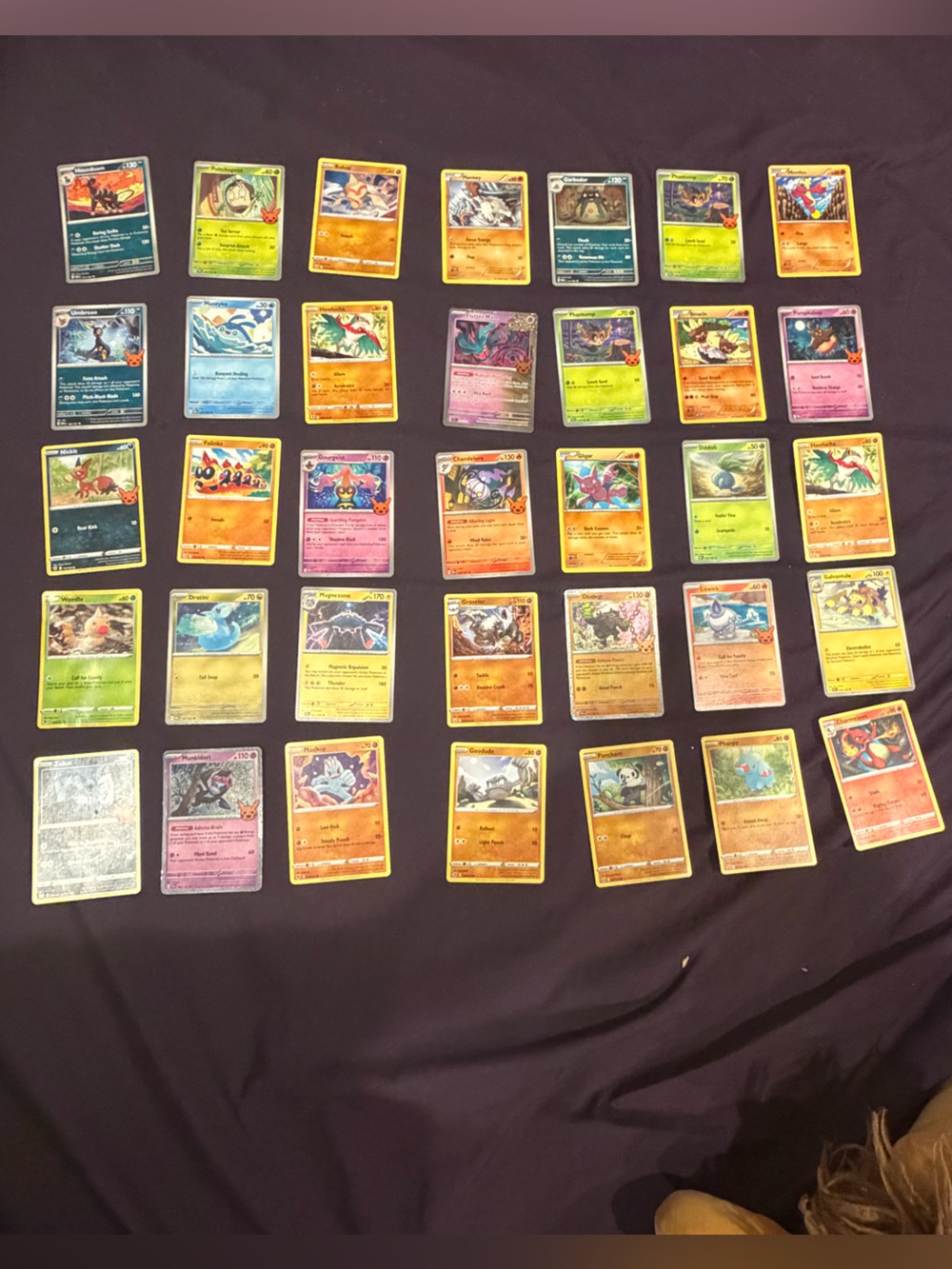 Pokemon Card Lot with Red, Blue, Green, Purple & Yellow Cards